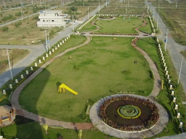 Aerial view of bedding plants laid out in a landscaped park